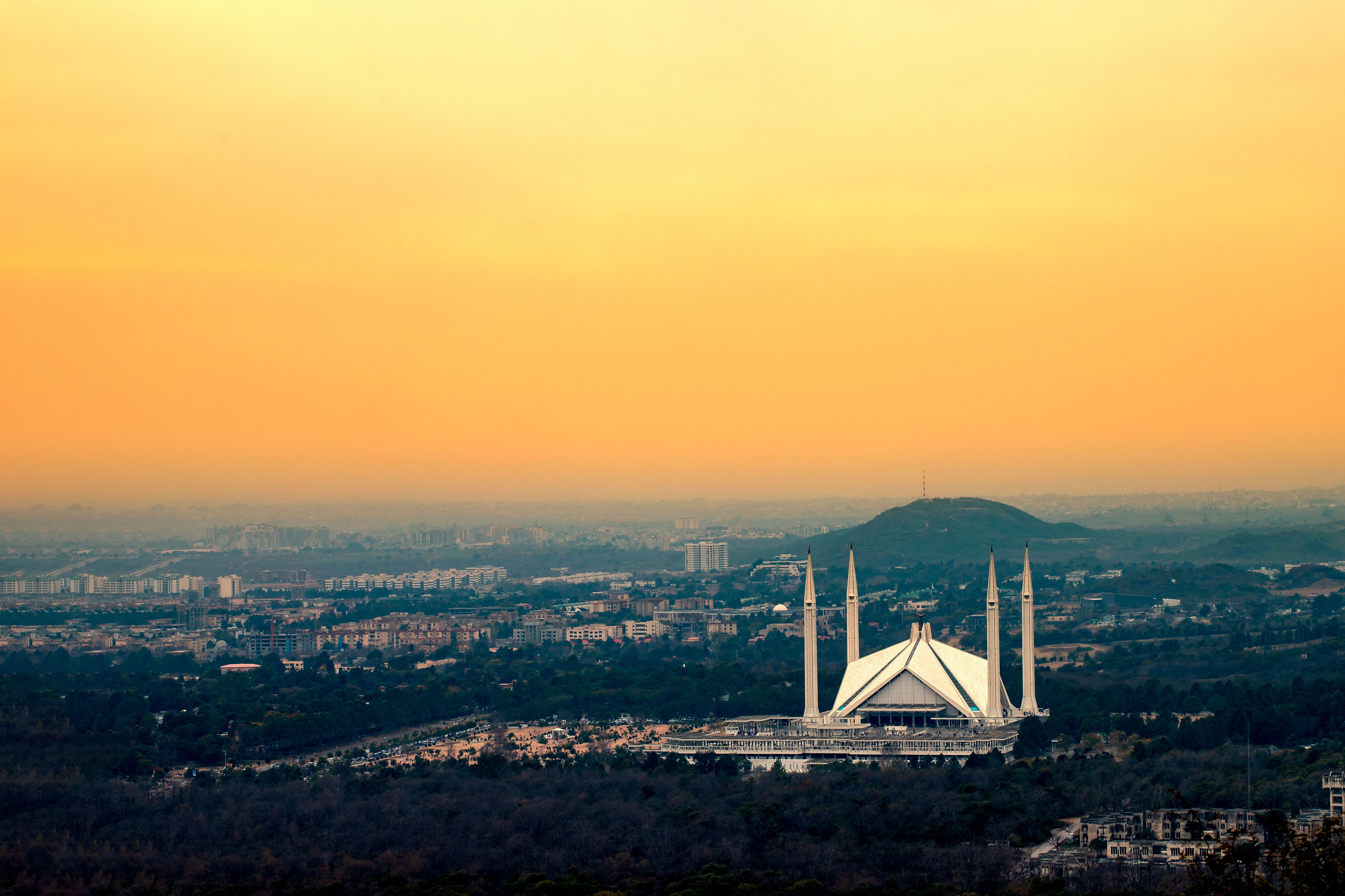 Faisal Mosque and Islamabad skyline at sunset